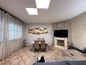 Appartamento con mansarda e terrazzi