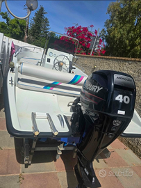 Barca motore e carrello stradale