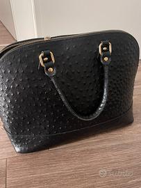 Borsetta in vera pelle. Nera . Nuova