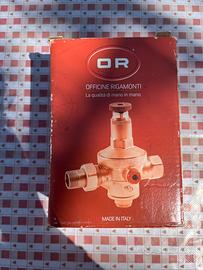 Gruppo di riempimento con ritegno