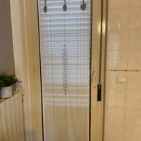 Tenda ricamata con tombolo