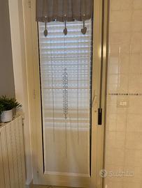 Tenda ricamata con tombolo