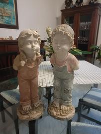 Coppia statue bimbi