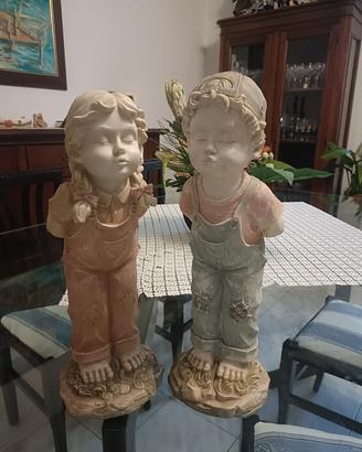 Coppia statue bimbi