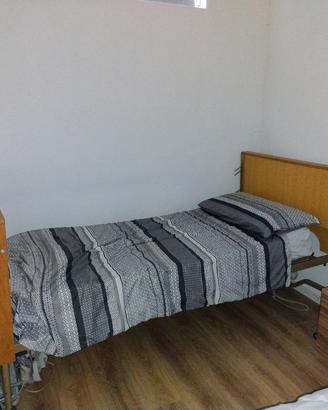 Letto con sollevatore elettrico