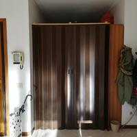 Porte pieghevoli marroni in pvc