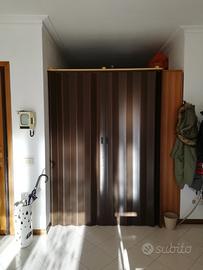 Porte pieghevoli marroni in pvc