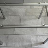 tavolo Tecno spa Norman Foster cristallo e metallo