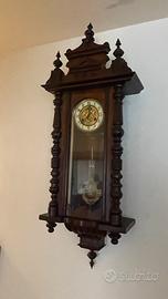Orologio a pendolo da muro