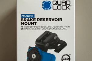 Quadlock brake reservoir mount