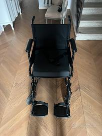 Sedia a rotelle con cuscino