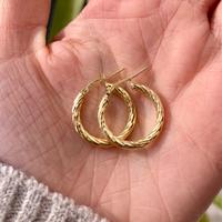 Orecchini lavorati a cerchio argento placcato oro