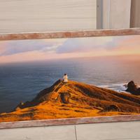 quadro tramonto con faro