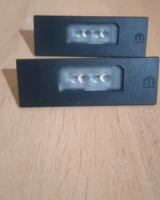 set 2 moduli luci targa led  genuine mopar nuove