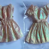 Vestiti dorati per barbie