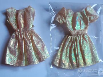 Vestiti dorati per barbie