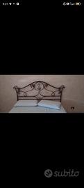 Letto in ferro battuto con rete a doghe