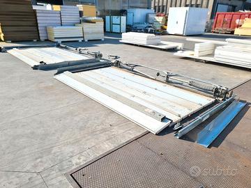 portoni sezionali per cella frigorifera usati