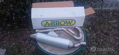 Impianto di scarico arrow