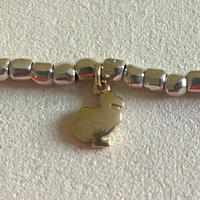 Ciondolo Dodo mini in oro giallo