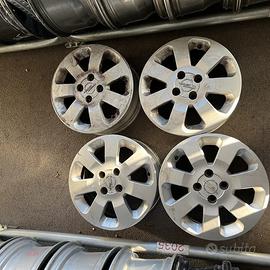 4 - CERCHI IN LEGA OPEL 6X15 4X100 ET49