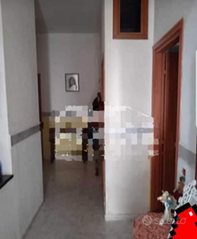 Casa piano rialzato con veranda