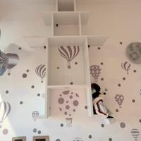 Mensola decortie a forma di omino