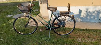 bicicletta donna con seggiolino per bambini