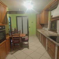 cucucina in castagno rivestita di muratura