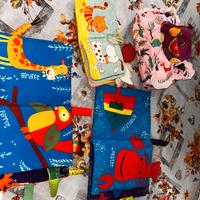 Set 4 libri in tessuto "rumorosi" per neonati