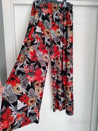 Pantaloni a gamba ampia, con elastico in vita