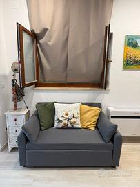 Divano letto grigio