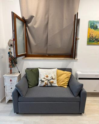 Divano letto grigio