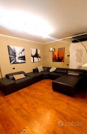 Divano angolare pelle grigia-da 4560€  a 1450€