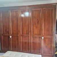 camera da letto  in legno noce 
