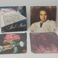 4 Dischi 45 giri in vinile  anni 70/80