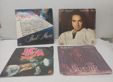 4 Dischi 45 giri in vinile  anni 70/80