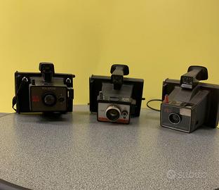 Varie Polaroid e Kodak fotocamere istantanee