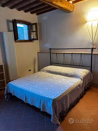 Letto matrimoniale in ferro battuto  e rete  doghe