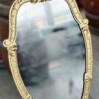 Specchio ovale dorato in stile barocco