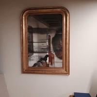 Antica specchiera in legno dorato
