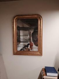 Antica specchiera in legno dorato