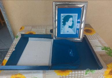 Cornice in argento e ciliegio