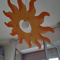 Lampadario di design a forma di sole