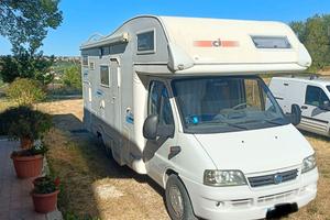 camper mansardato