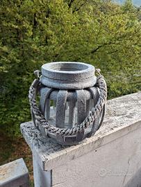 Portacandele effetto pietra grigio.