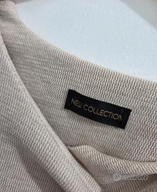 Maglia beige con maniche a campana L