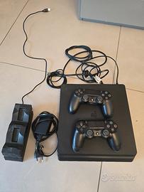 Playstation PS4 + giochi 2 joypad e base ricarica