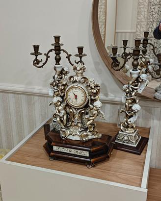 orologio, due porta candele e due lumi de