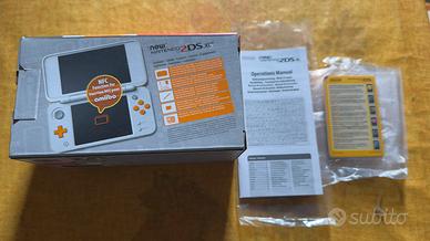 New Nintendo 2DS XL + giochi + custodia + scatola